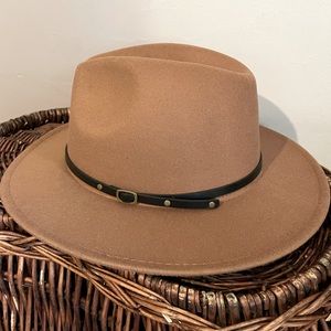 Camel colored faux leather strapped fedora.